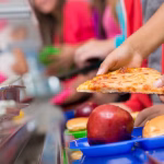 0_School-children-getting-food-in-the-cafeteria-line.jpg