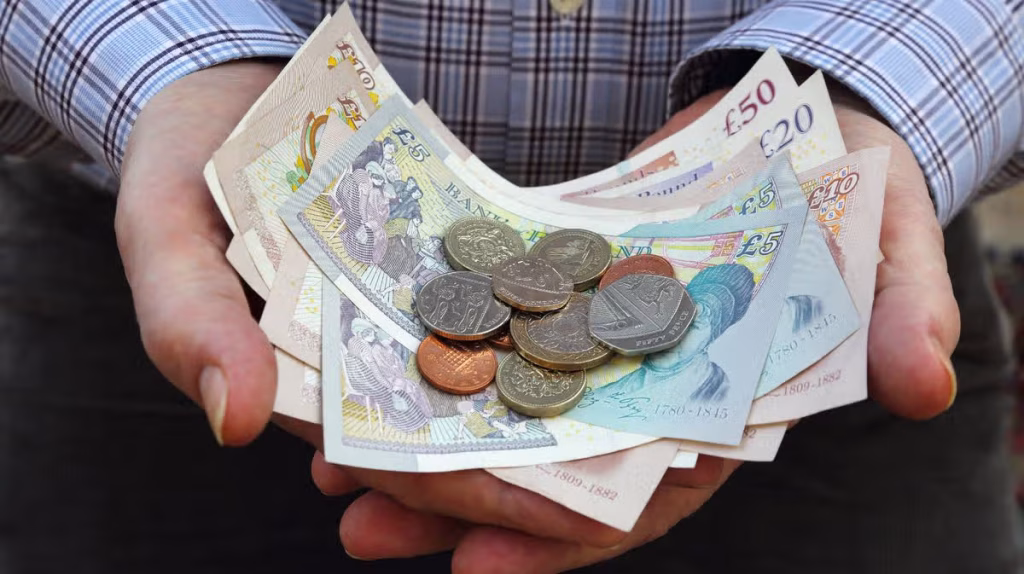 0_British-currency-in-senior-males-hands.jpg