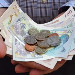 0_British-currency-in-senior-males-hands.jpg