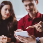 6_Real-estate-agent-explaining-housing-loan-details-to-an-Asian-couple.jpg