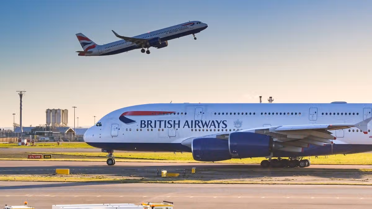 1_British-Airways-Airbus-A380-with-another-of-the-airlines-planes-taking-off-in-the-background.jpg